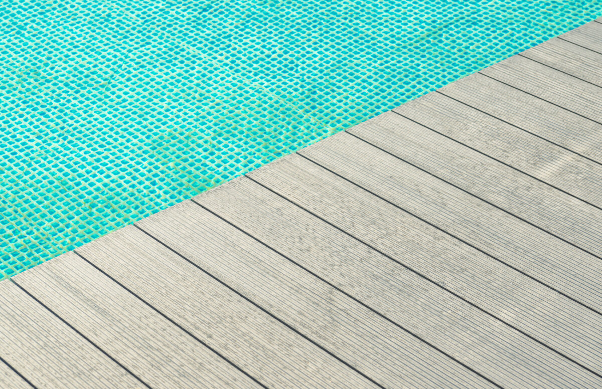 a composite deck near swimming pool